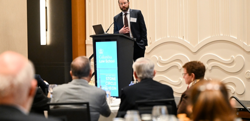 Professor Jeremy Kessler at a podium