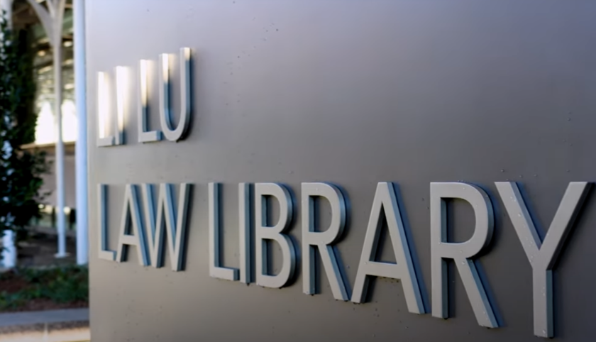 Sign that reads "Li Lu Law Library"