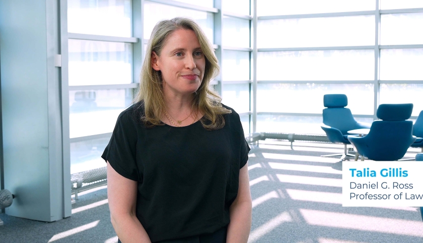 Professor Talia Gillis wearing a black shirt.