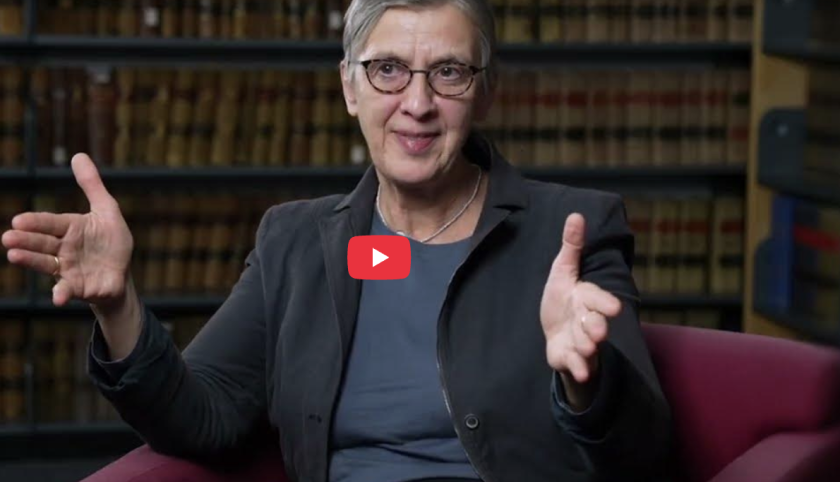 Katharina Pistor with a video play button 