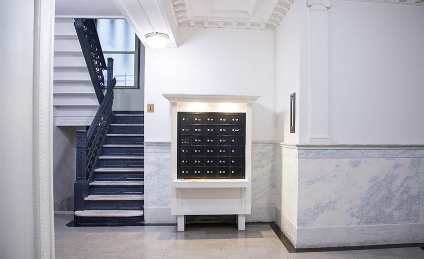 The mailboxes in the lobby of a typical Columbia Law apartment