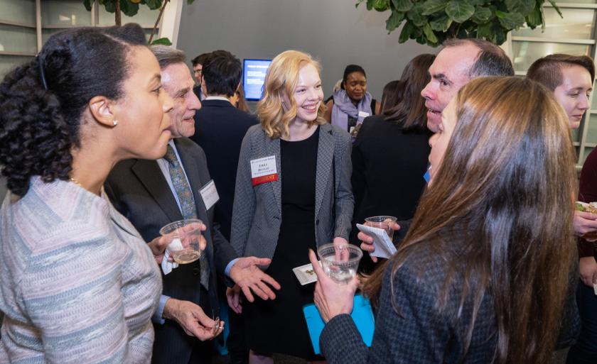 Students socialize with alumni and employers at the Public Interest/Public Service reception.