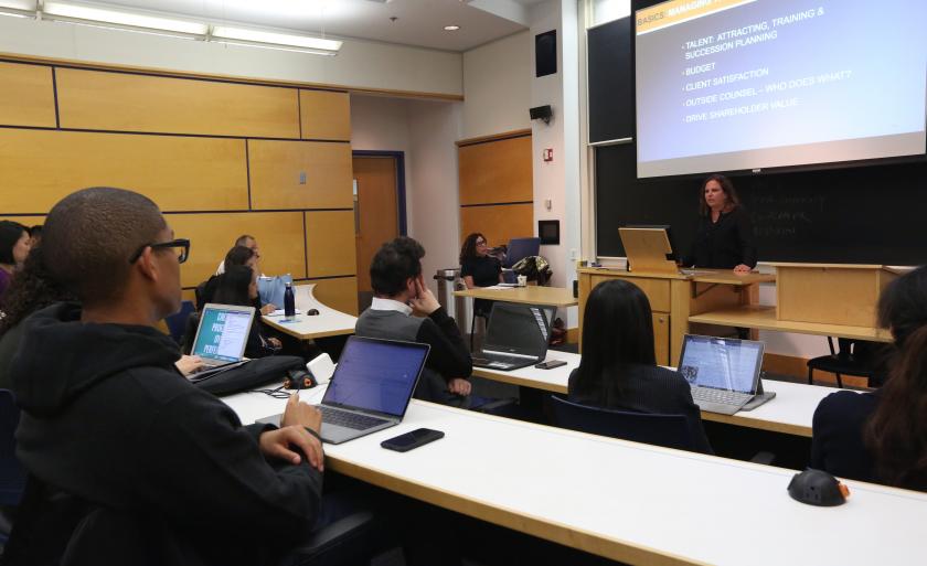 Hilary Krane speaks in front of a lecture hall