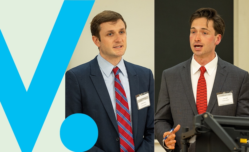 Alexander Herkert ’23 and Conor Regan ’23 speaking at podiums