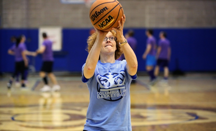 Dean Gillian Lester holds a basketball in the 2017 Dean's Cup.