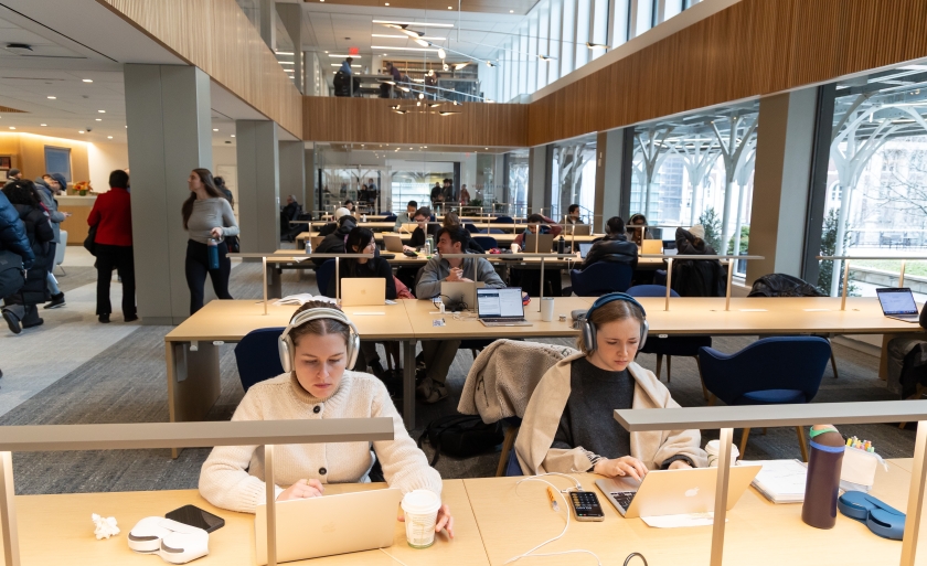 Students studying at tables