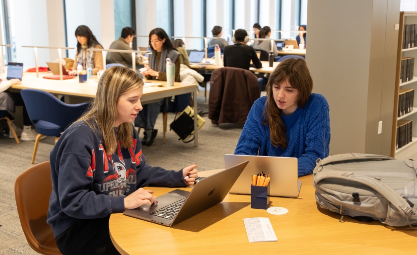 Students studying at tables