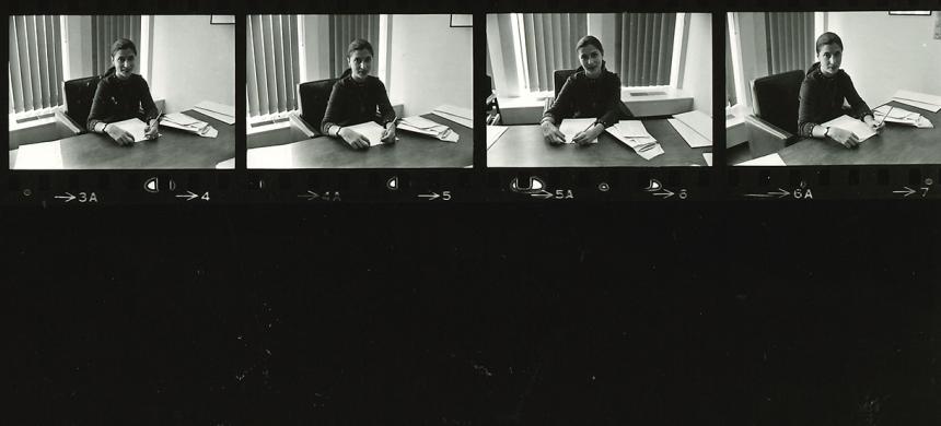 Ruth Bader Ginsburg sits at her desk as a professor in the 1970s.