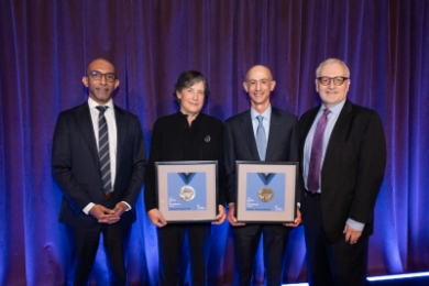 Dean Abebe, Elizabeth Glazer ’86, David Greenwald ’83, G. Wade Leak ’89, with Medals for Excellence