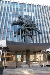 Front of the Law School with sign that says "Li Lu Law Library"