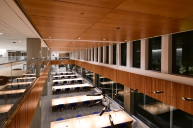 overhead photo of a large room with windows and long tables