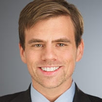 Headshot of Alex Hogan