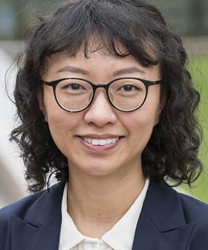 Portrait of Fiona Chong ’18 LL.M. smiling in business attire