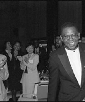 Professor Kellis E. Parker being applauded