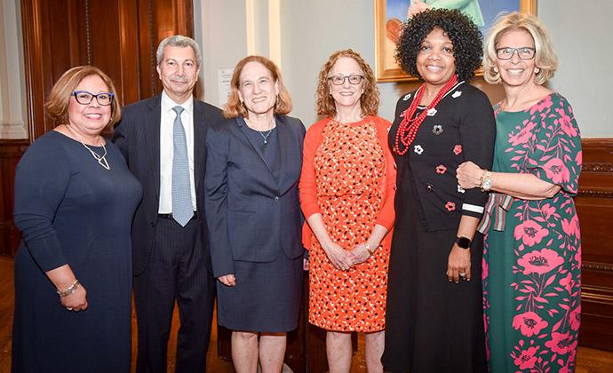 Professor Jane Spinak smiling and posing with fellow McDonald Award winners at the City Bar