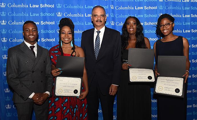 (Left to right) Vendarryl Jenkins ’20, U.D. Nnamdi ’21, Former United States Attorney General Eric H. Holder, Jr. ’76, Delia Addo-Yobo ’19, Gelsey Beaubrun ’20