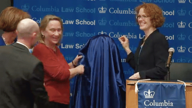 From left, Professor Sarah Cleveland, Laura Roosevelt, and Dean Gillian Lester unveil the bust of Eleanor Roosevelt.