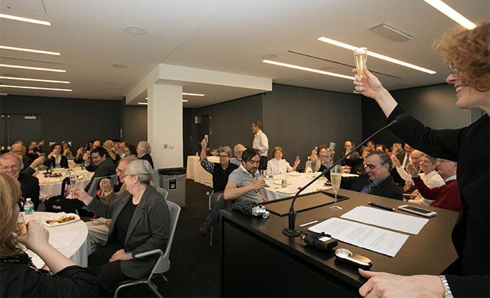 Dean Gillian Lester toasts former Dean Lance Liebman at his retirement luncheon.