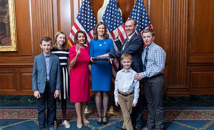 Ben McAdams and his family at his swearing-in with Nancy Pelosi. Courtesy official House photographer.