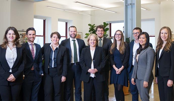 Robbie Kaplan '91 (center) with the staff of Kaplan & Company, the firm she launched on July 1, 2017