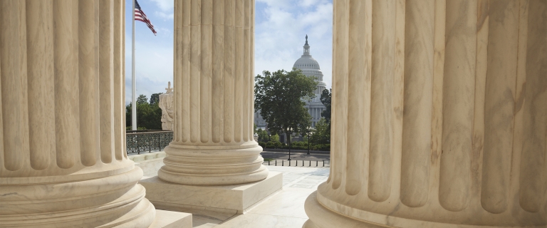 The capitol building, as seen from the portico of Supreme Court