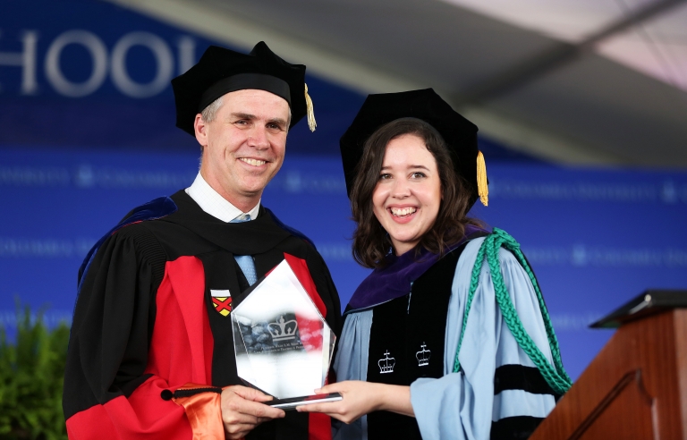 Eric Talley accepts the Willis Reese Prize for Excellence in Teaching from Beatrice Kelly '17 at Graduation 2017.