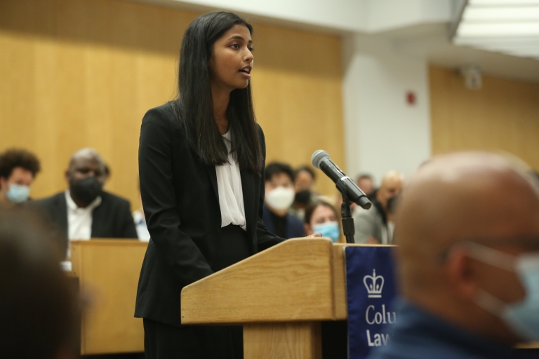 Aneesa Mazumdar ’22 at a podium