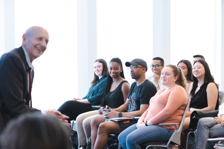 Man with audience of students