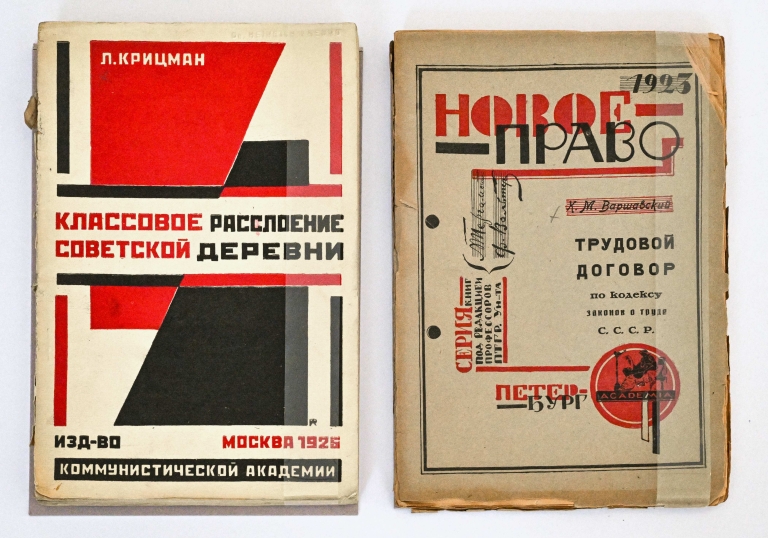 Two red, white, and black books covers with constructivist graphics