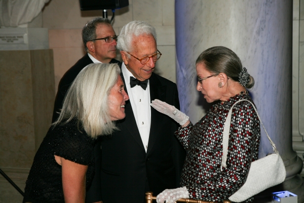 Ira Millstein greets Ruth Bader Ginsburg at the Supreme Court gala dinner