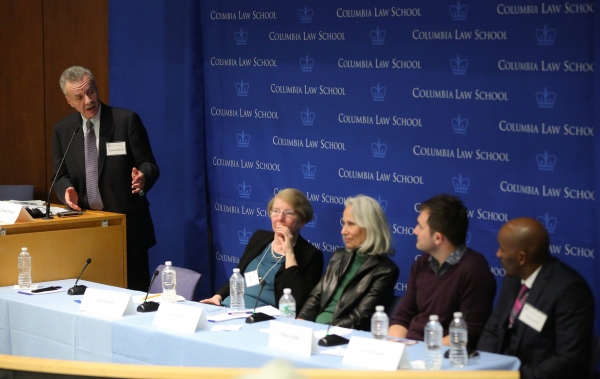 (left to right) Professor Conrad Johnson (standing), Jane Booth ’76, Lynn Povich, Kalani Leifer, and Scott Lewis discuss clinical education.