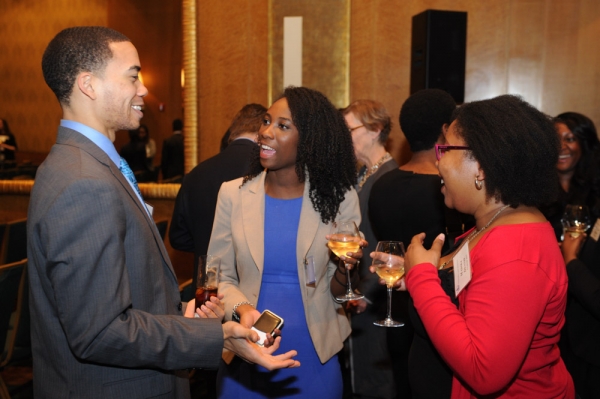 Attendees socialize at the 2016 Alumni of Color reception