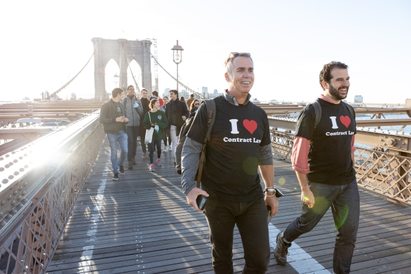 Professors Talley (left) and Arato (right) lead their students across the Brooklyn Bridge.