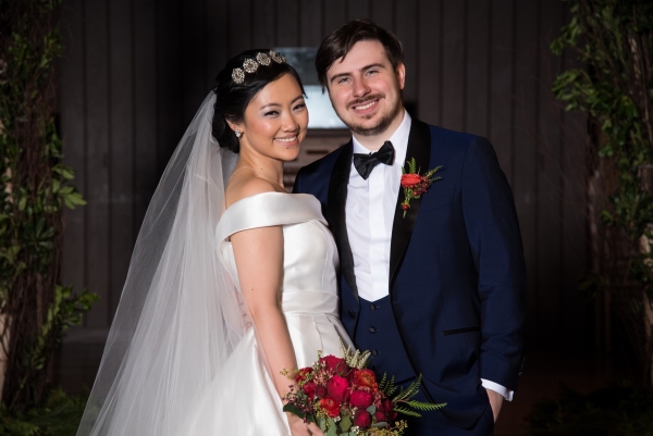 Woman in wedding dress and man in tuxedo