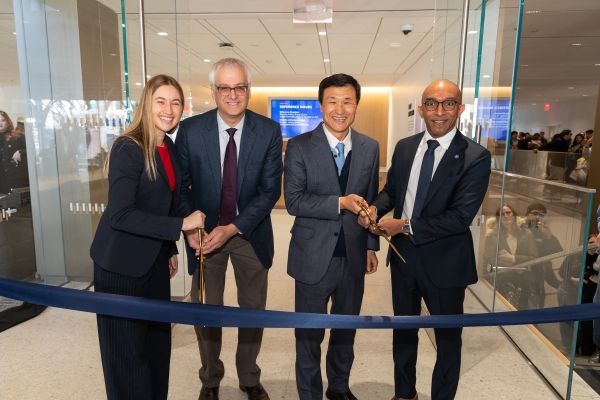 Cutting Ribbon Library Opening Dec 5