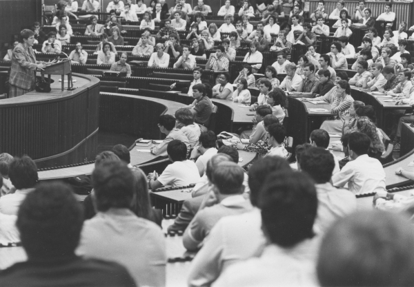 A black and white photo of a law school classroom with students and a professor