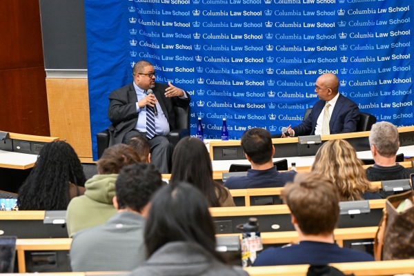 Alvin Bragg and Dean Daniel Abebe at an LCI event in February 2026