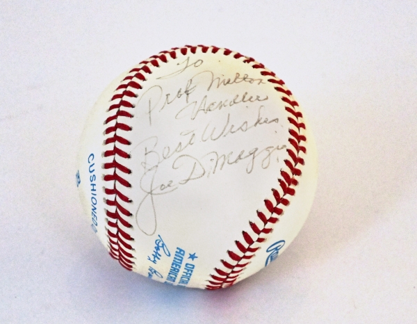 Baseball inscribed to Milton Handler by Joe DiMaggio