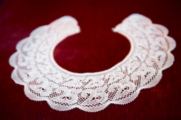 A custom lace collar typical of the ones worn by Ruth Bader Ginsburg