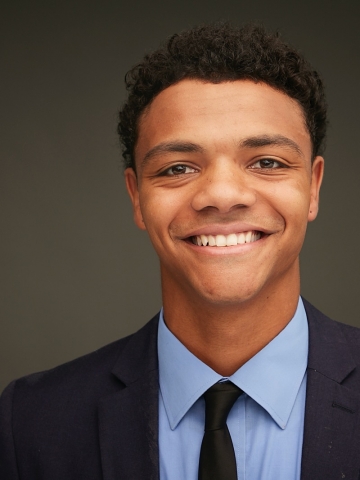 Columbia Law student Isaiah Strong ’22 in suit and tie