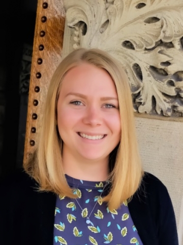 Columbia Law student Madeleine Durbin ’21 in colorful blouse and dark jacket