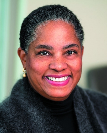 Headshot of woman in gray fuzzy jacket