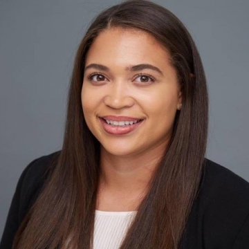 Columbia Law student Michaela Bolden ’21 in white shirt and dark jacket