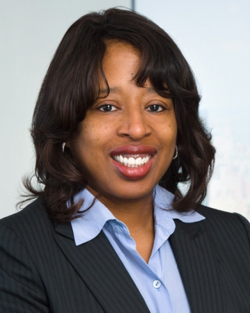 Headshot of woman in blue shirt