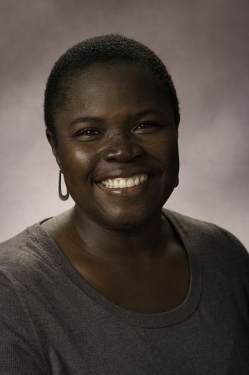 Woman with short hair and hoop earring