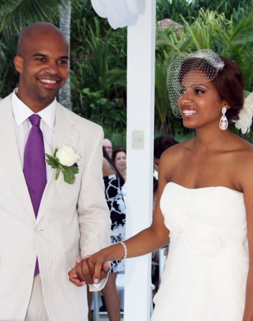 bride and groom wearing white at outdoor wedding