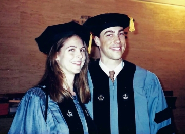 man and woman in tams and gowns at Columbia Law graduation