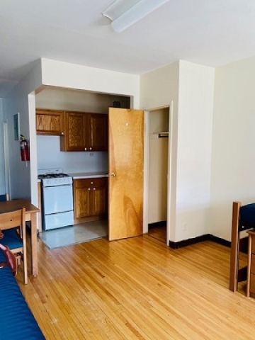 Image of a dorm room with a small kitchen in Watt Hall