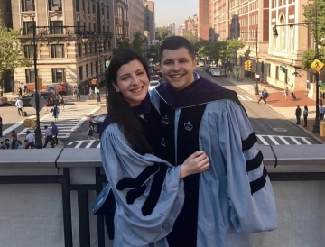 Alexandra Settelmayer and Michael Linneman in their graduation gowns