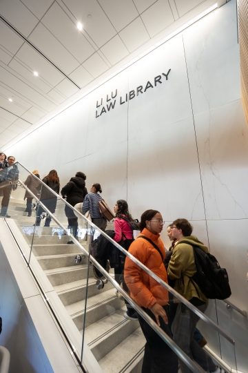 Students walking up and down staircase